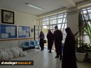 توزیع بسته های معیشتی توسط خیرین و کارکنان آموزشکده فنی و حرفه ای دختران ملایر  10